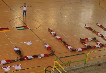 صور من فعالية مؤازرة المانيا من اطفال مشروع مركز العائلة بنادى خدمات رفح