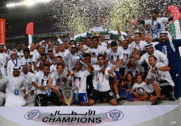 صورة للتتويج العين ببطولة الدوري 